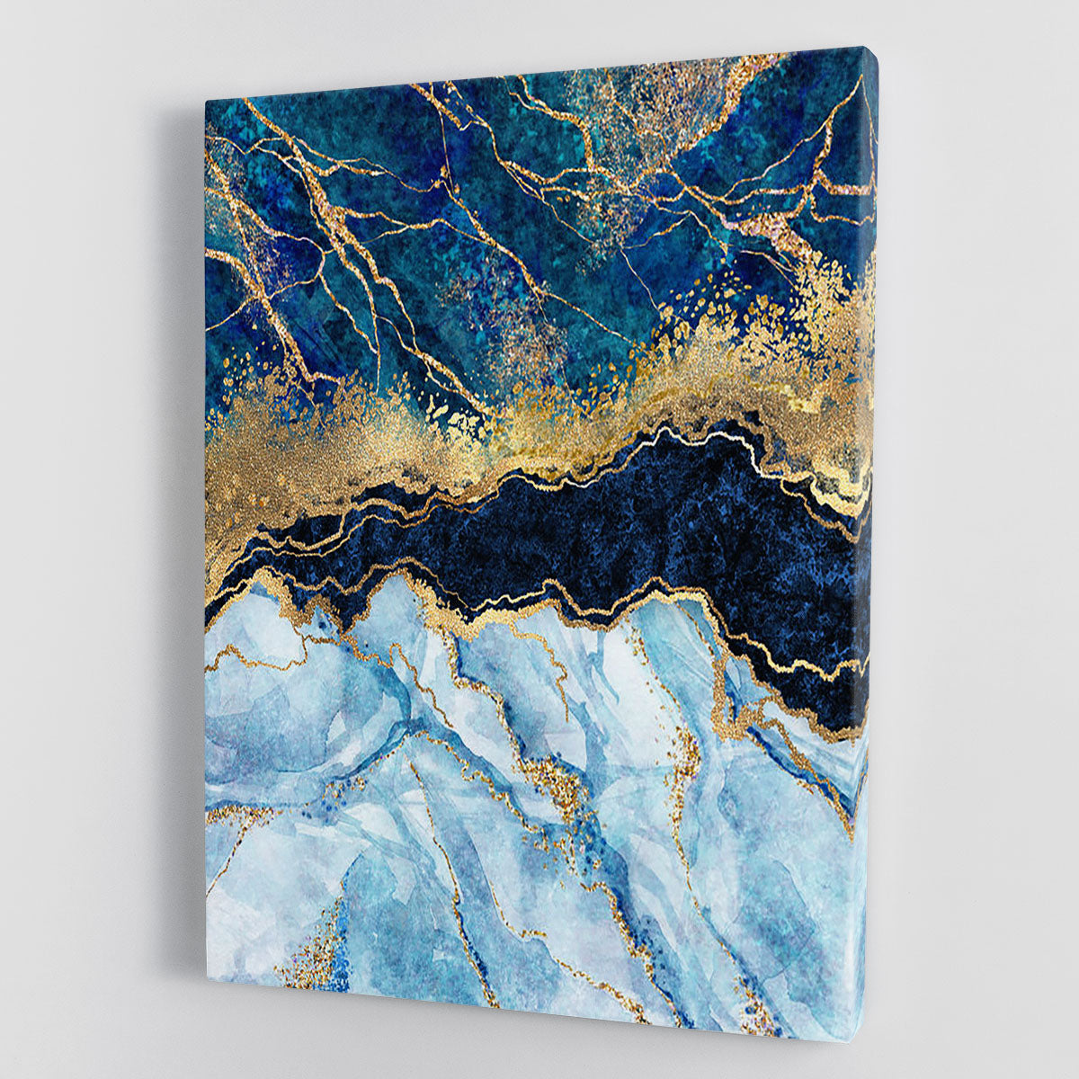 Blue and gold abstract canvas print used as contemporary wall art for a modern room