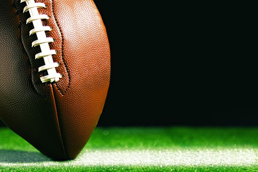 American football on green grass Wall Mural Wallpaper - Canvas Art Rocks - 1