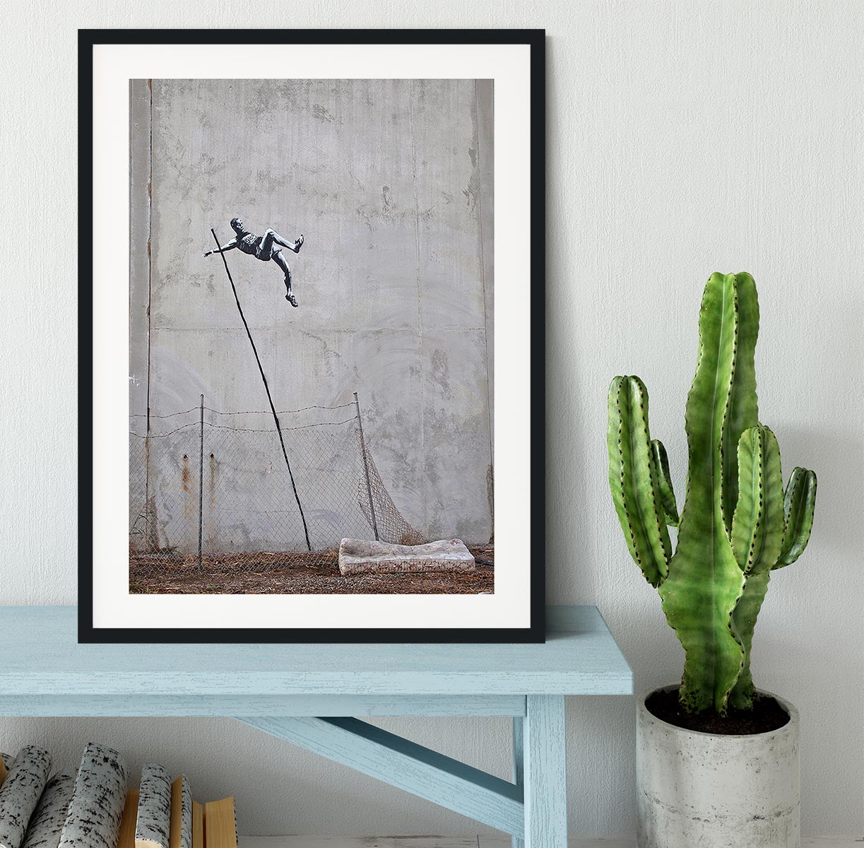 Banksy Pole Vaulter Framed Print - Canvas Art Rocks - 1