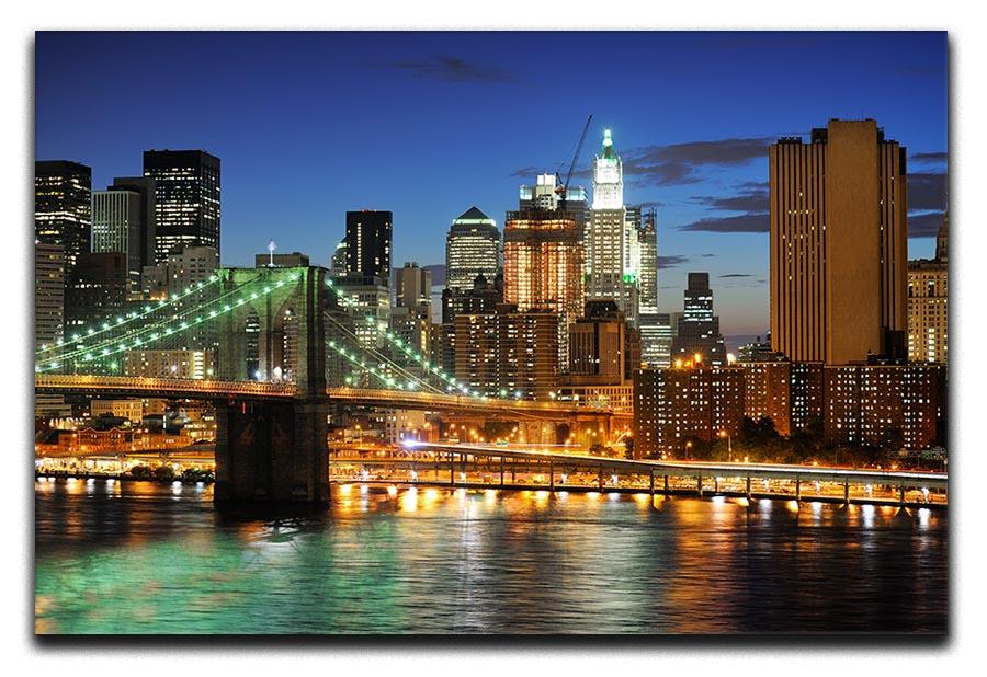 Brooklyn bridge downtown at night Canvas Print or Poster - Canvas Art Rocks - 1
