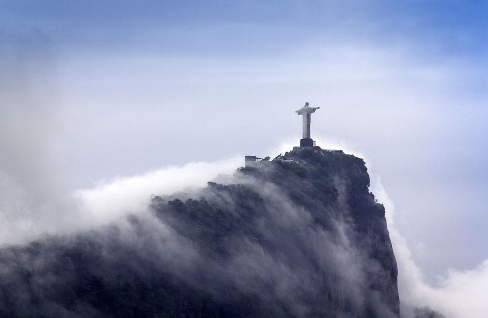 Christ the Redeemer in clouds Wall Mural Wallpaper - Canvas Art Rocks - 1