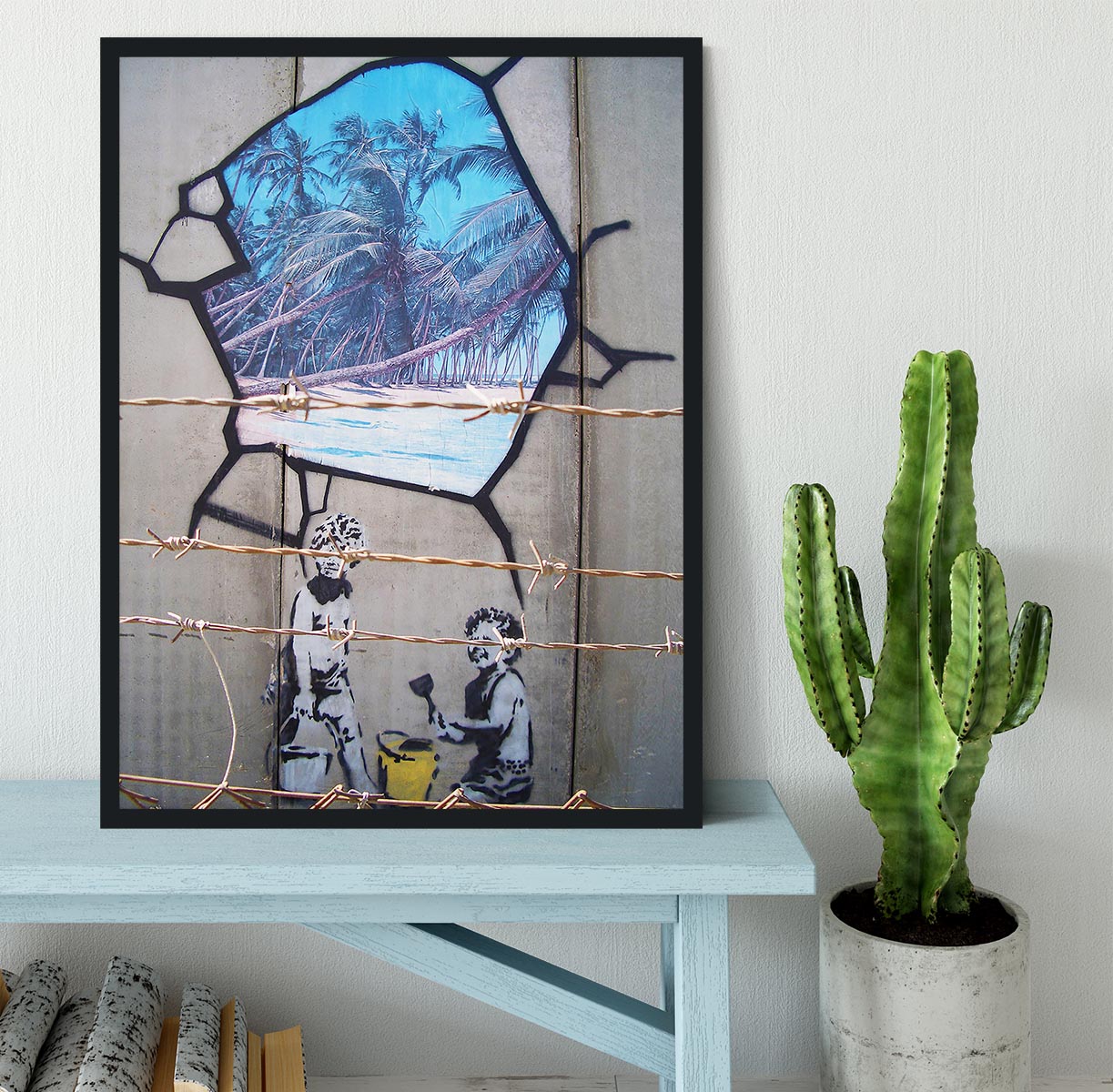 Banksy Finding Paradise Framed Print