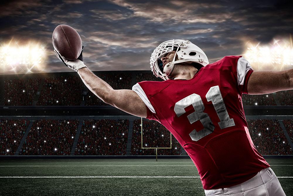 Football Player with a red uniform Wall Mural Wallpaper - Canvas Art Rocks - 1