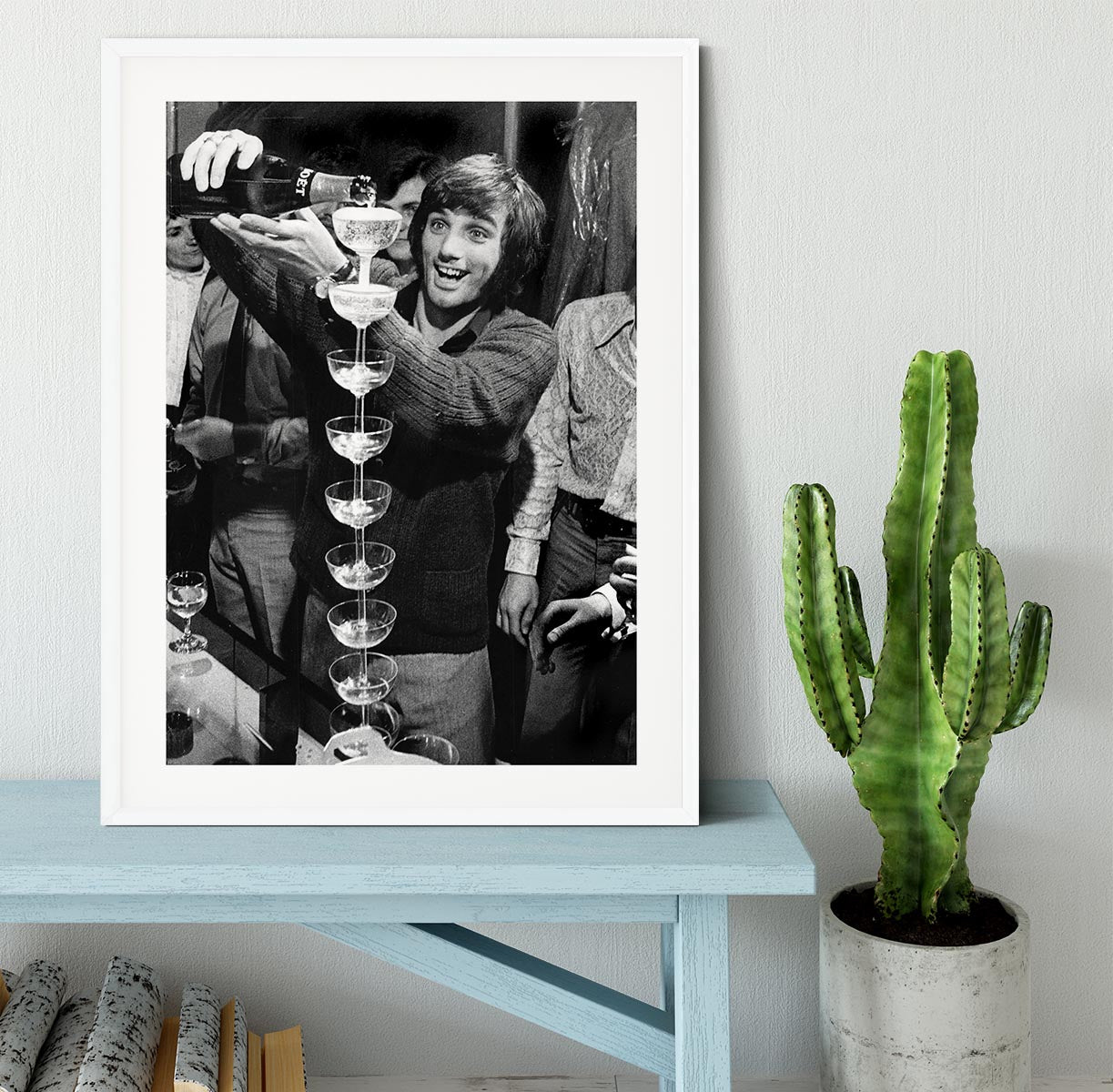 George Best pouring champagne Framed Print - Canvas Art Rocks - 5