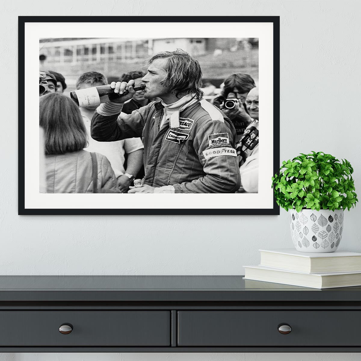 James Hunt swigging champagne Framed Print - Canvas Art Rocks - 1