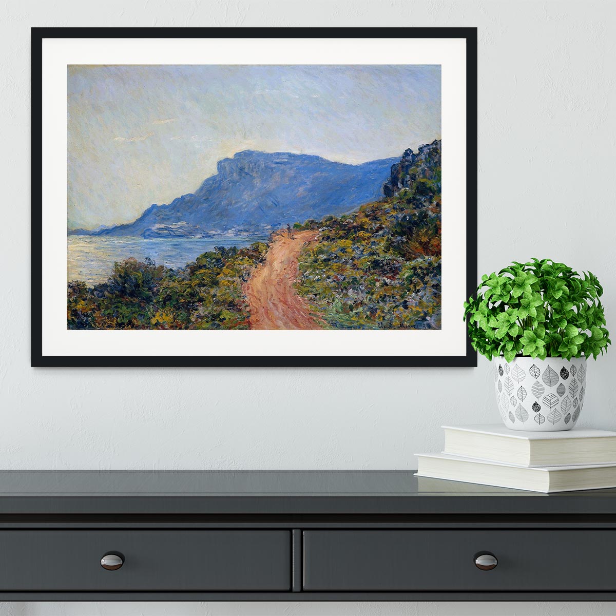 A framed coastal landscape print by Monet for calm wall art styling