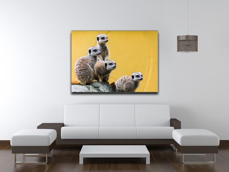 A group of meerkats seen on top of a rock Canvas Print or Poster - Canvas Art Rocks - 4