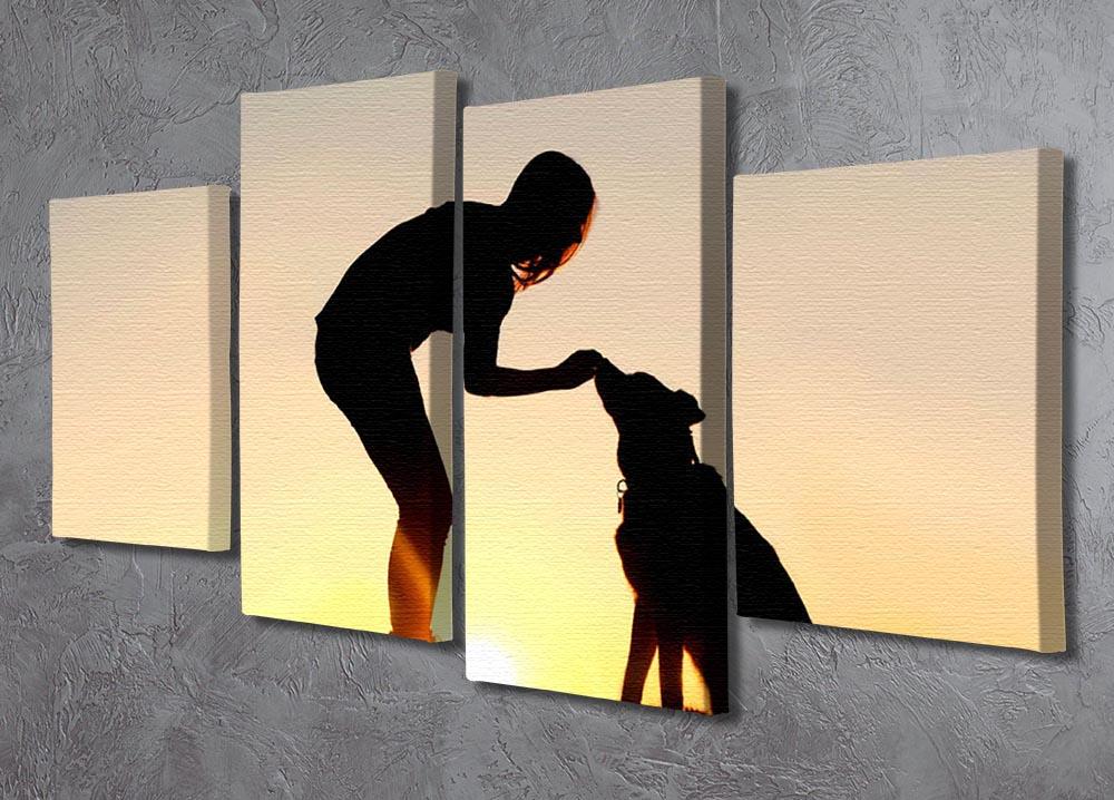 A silhouette of a girl sitting outside in the grass with her pet German Shepherd Mix Dog feeding him treats during training in front of a sunsetting sky. 4 Split Panel Canvas - Canvas Art Rocks - 2