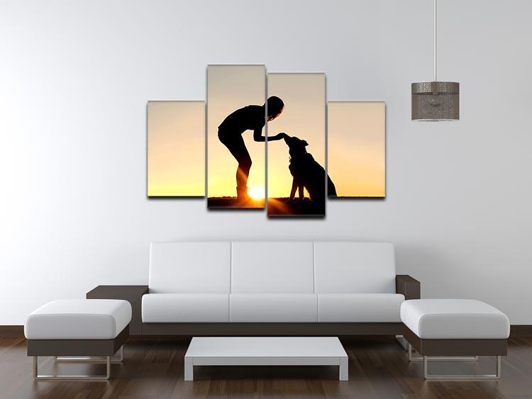 A silhouette of a girl sitting outside in the grass with her pet German Shepherd Mix Dog feeding him treats during training in front of a sunsetting sky. 4 Split Panel Canvas - Canvas Art Rocks - 3