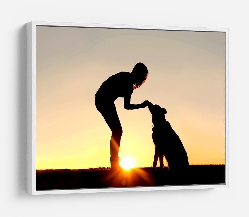 A silhouette of a girl sitting outside in the grass with her pet German Shepherd Mix Dog feeding him treats during training in front of a sunsetting sky. HD Metal Print - Canvas Art Rocks - 7