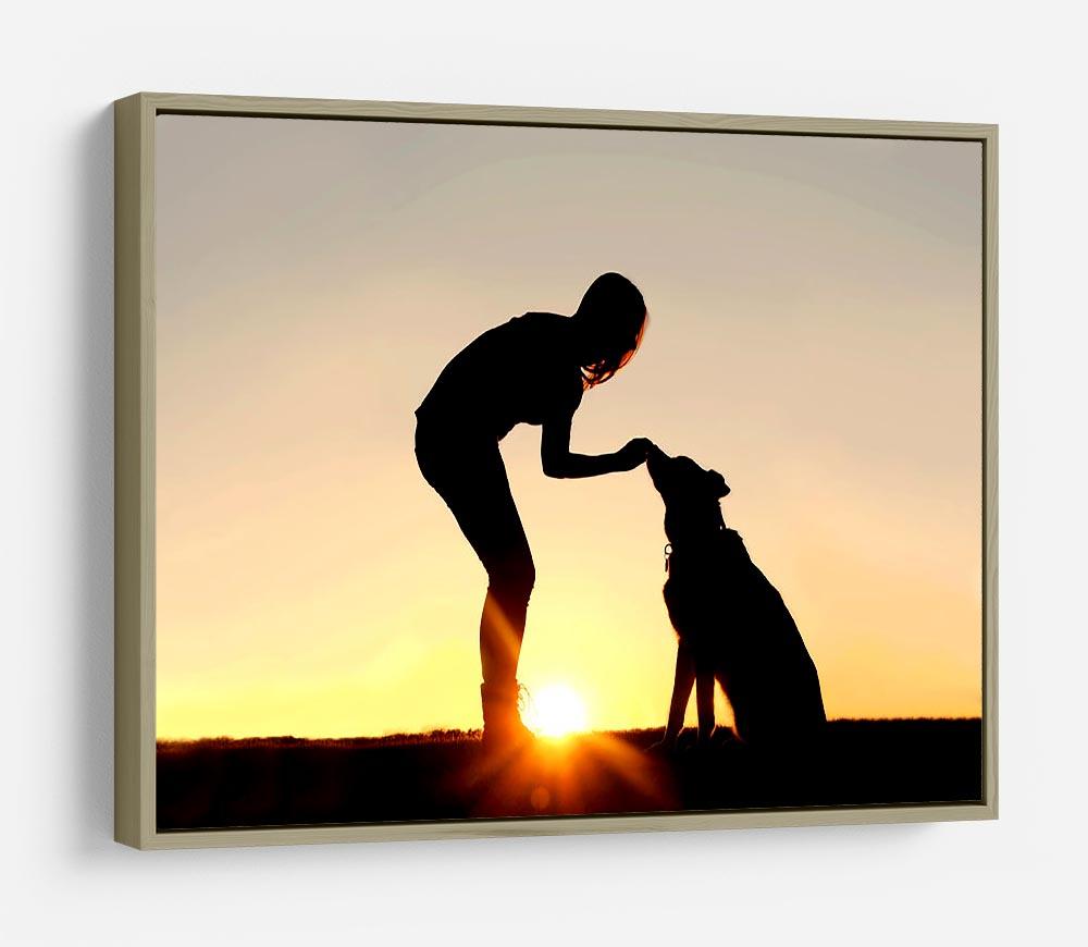 A silhouette of a girl sitting outside in the grass with her pet German Shepherd Mix Dog feeding him treats during training in front of a sunsetting sky. HD Metal Print - Canvas Art Rocks - 8