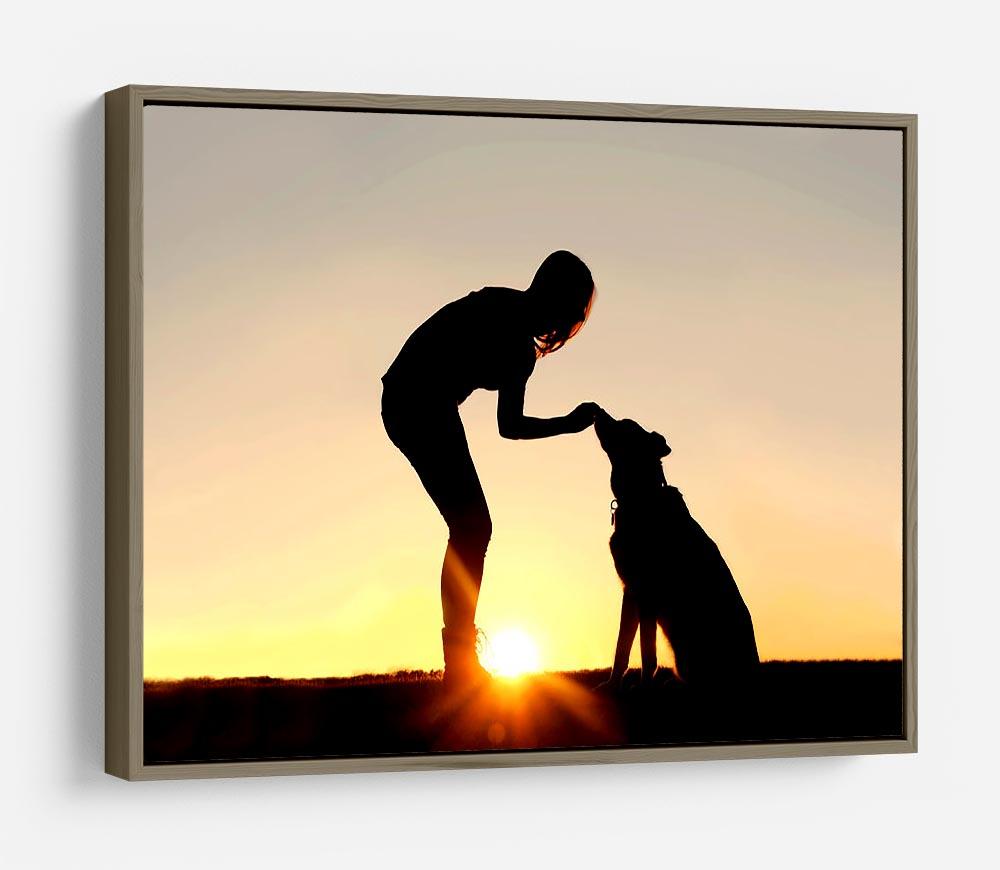 A silhouette of a girl sitting outside in the grass with her pet German Shepherd Mix Dog feeding him treats during training in front of a sunsetting sky. HD Metal Print - Canvas Art Rocks - 10