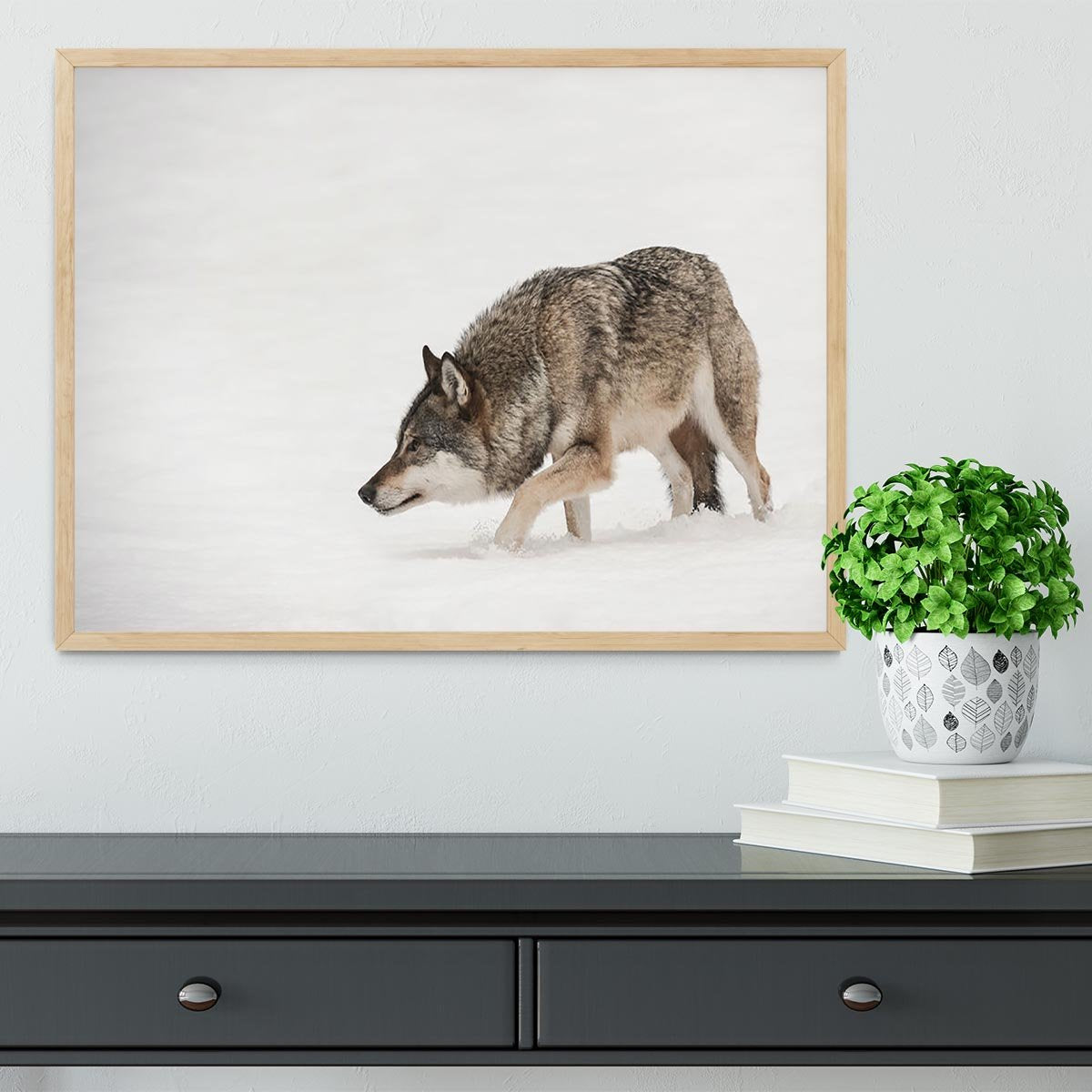 A solitary lone wolf prowls through snow Framed Print - Canvas Art Rocks - 4