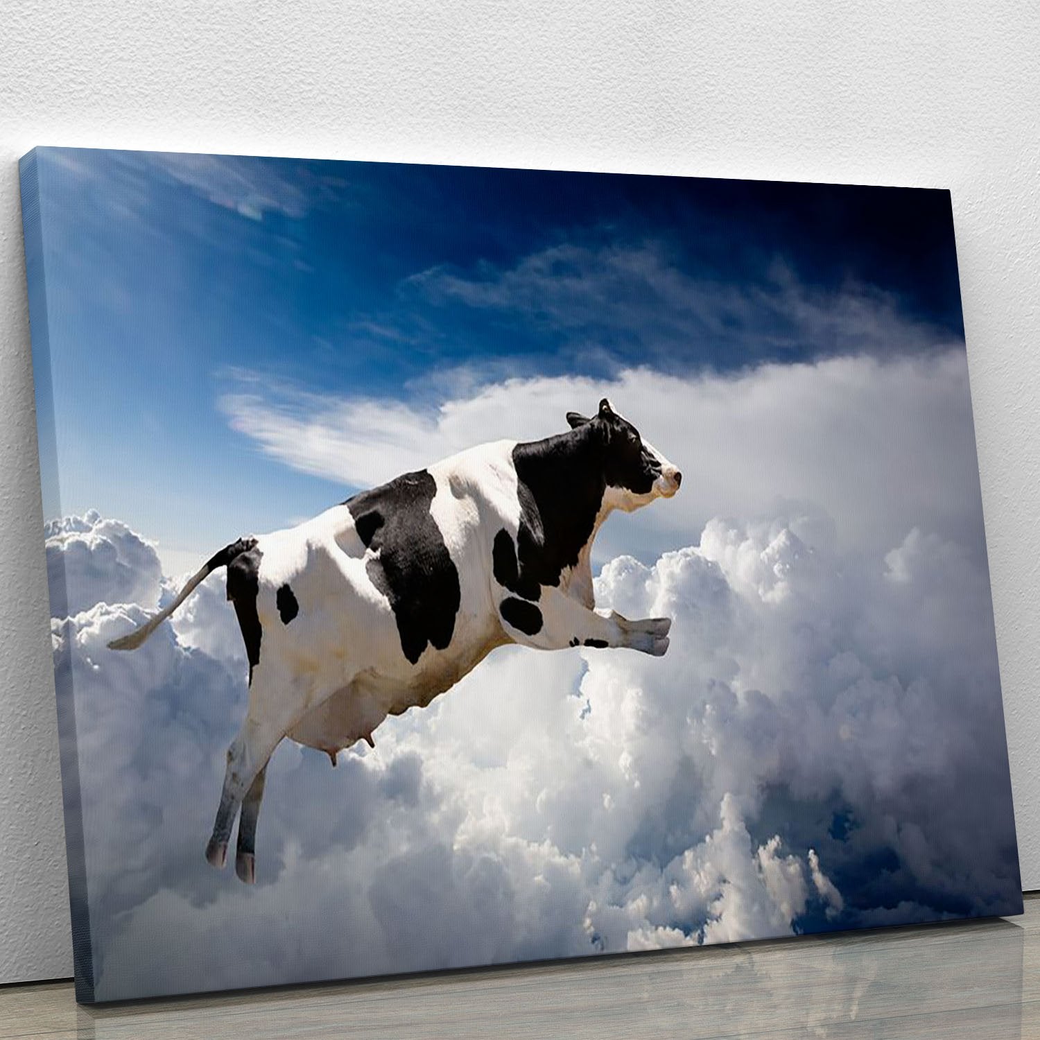 A super cow flying over clouds Canvas Print or Poster