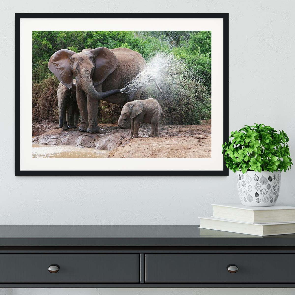 African elephant mother and baby cooling off Framed Print - Canvas Art Rocks - 1