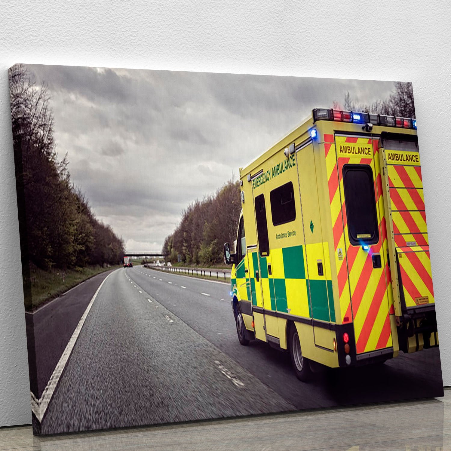 Ambulance responding to an emergency Canvas Print or Poster