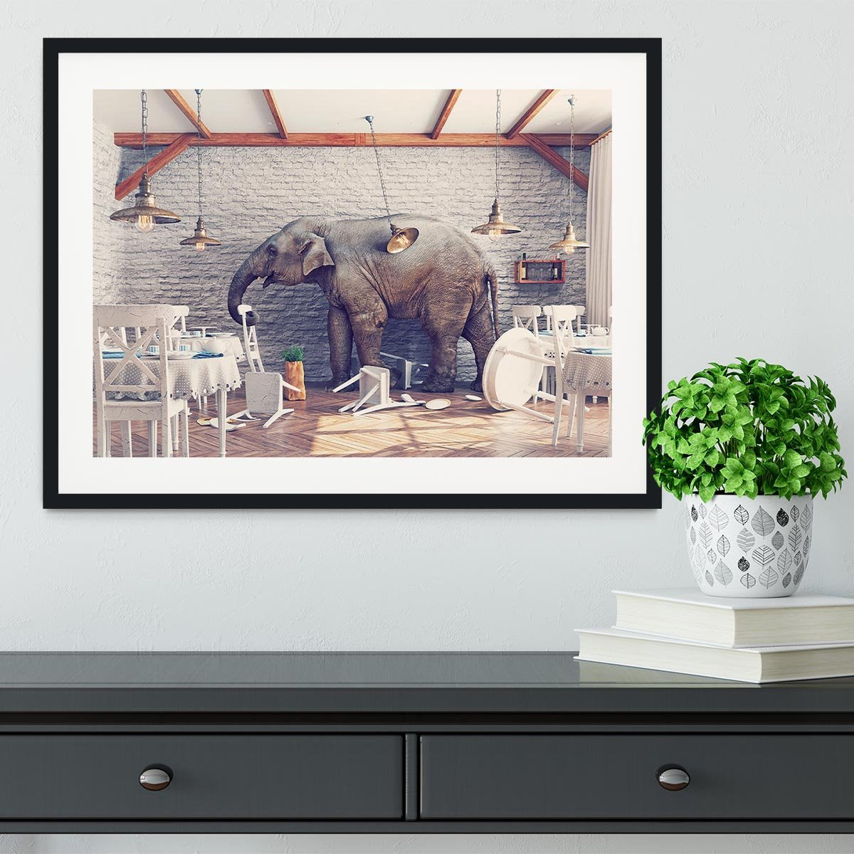 An elephant calm in a restaurant interior Framed Print - Canvas Art Rocks - 1
