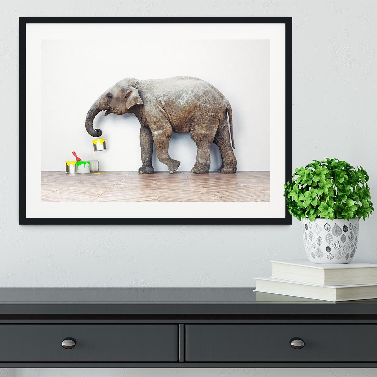 An elephant with paint cans Framed Print - Canvas Art Rocks - 1
