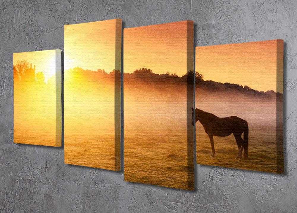 Arabian horses grazing on pasture at sundown in orange sunny beams. Dramatic foggy scene 4 Split Panel Canvas - Canvas Art Rocks - 2