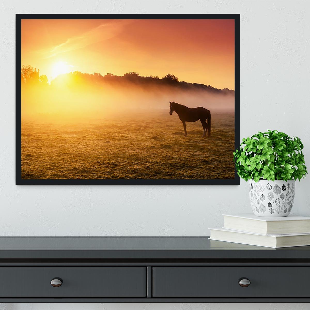Arabian horses grazing on pasture at sundown in orange sunny beams. Dramatic foggy scene Framed Print - Canvas Art Rocks - 2