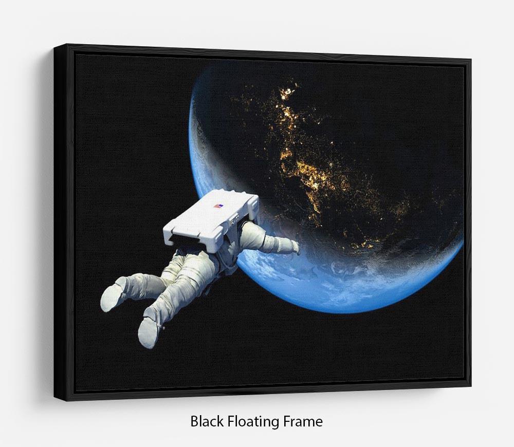 Astronaut Floating to Earth Floating Framed Canvas