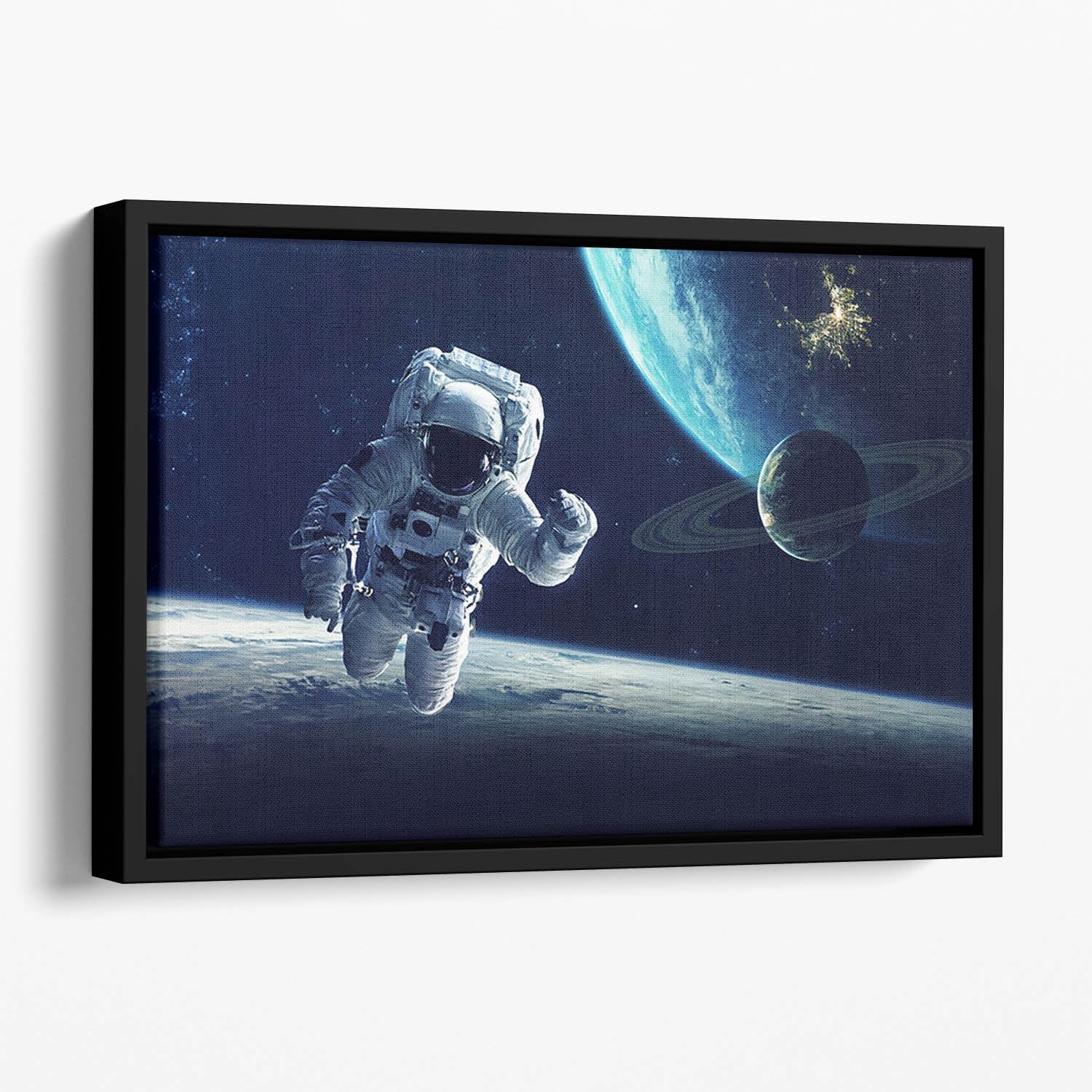 Astronaut at spacewalk Floating Framed Canvas