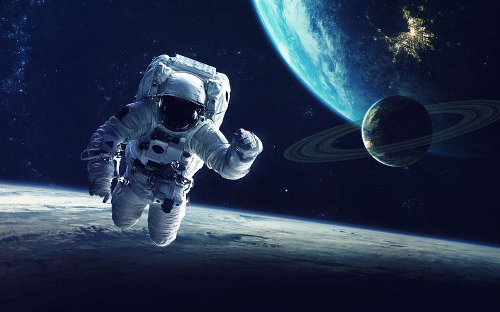 Astronaut at spacewalk Wall Mural Wallpaper - Canvas Art Rocks - 1