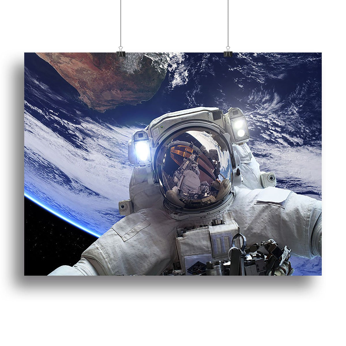 Astronaut in outer space against the backdrop Canvas Print or Poster