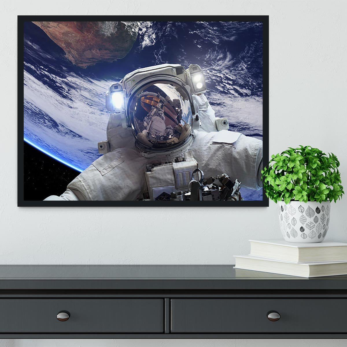Astronaut in outer space against the backdrop Framed Print - Canvas Art Rocks - 2