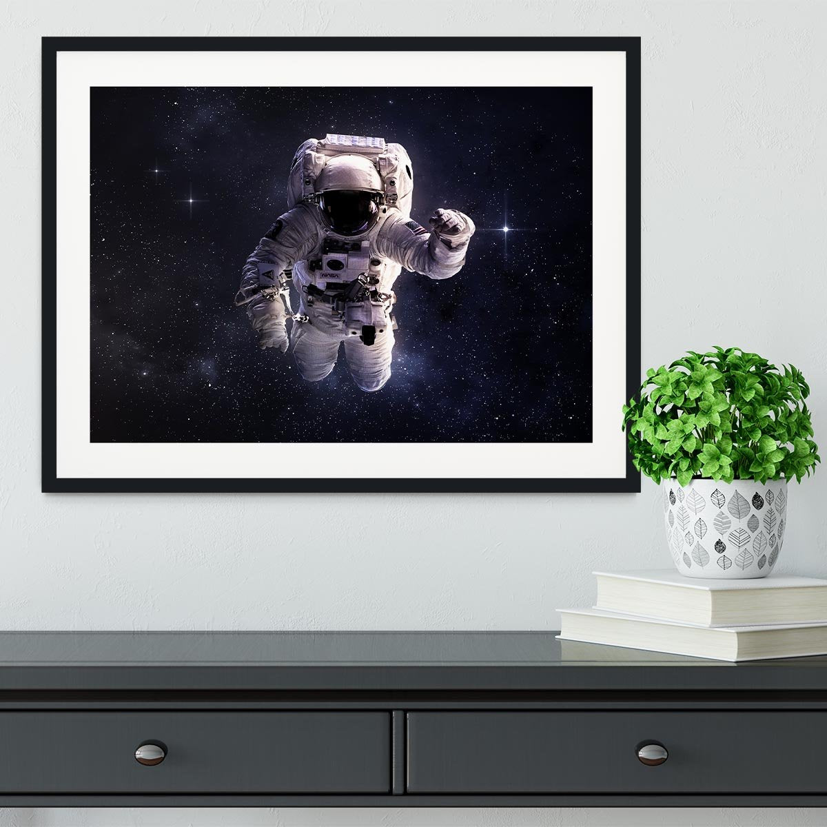 Astronaut in outer space with stars Framed Print - Canvas Art Rocks - 1