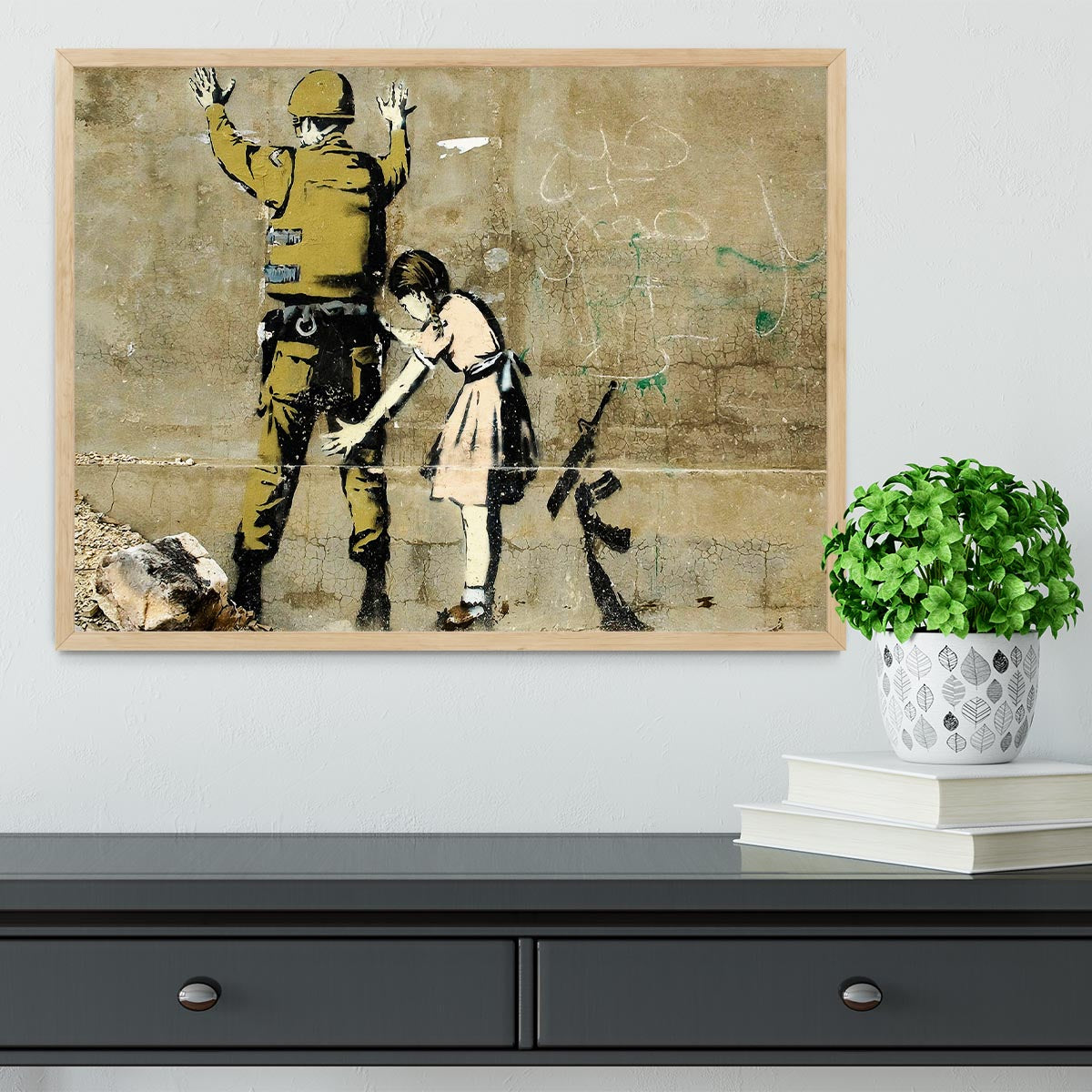 Banksy Girl and Soldier Framed Print