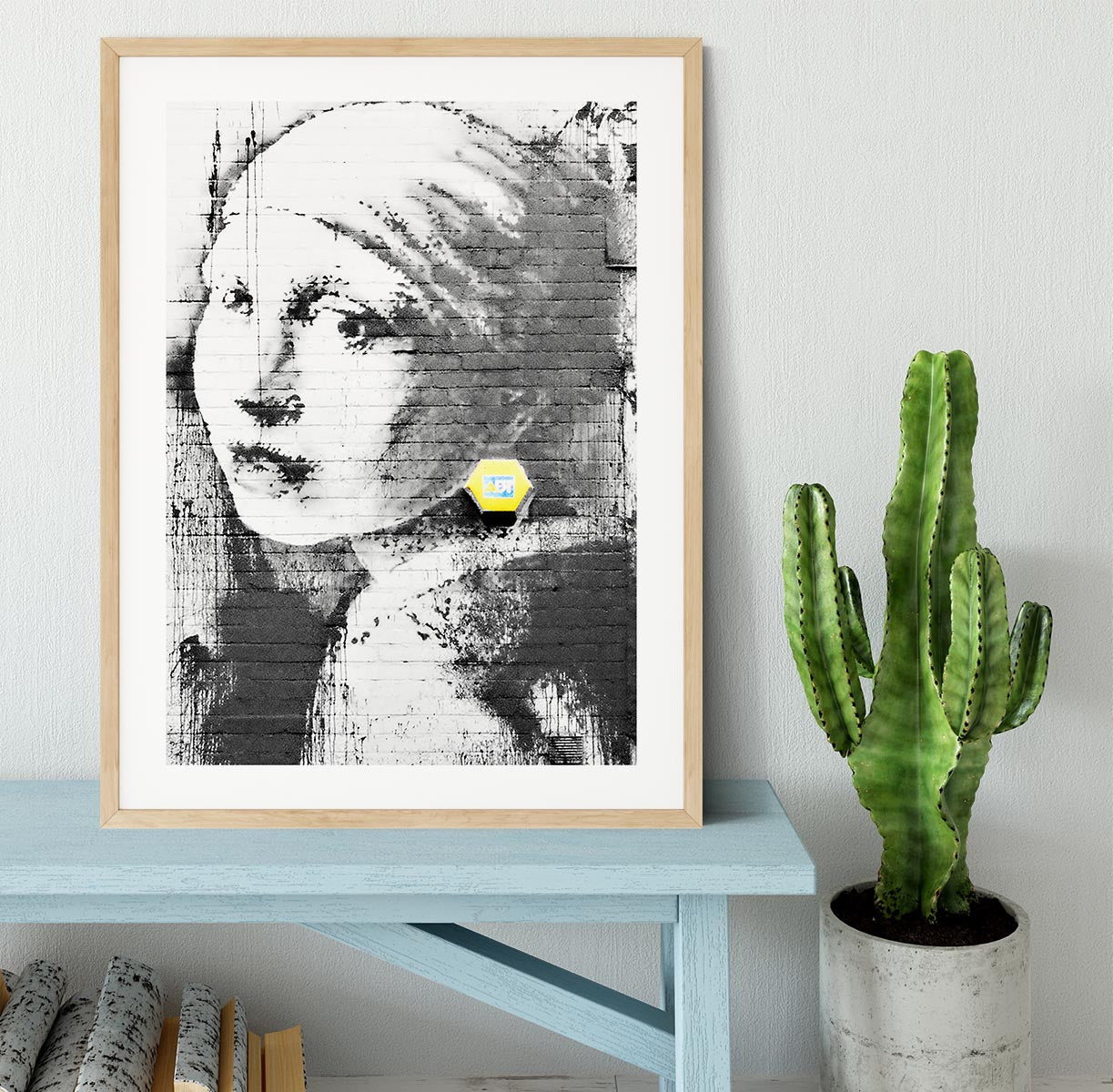 Banksy Girl With a Pierced Eardrum Framed Print