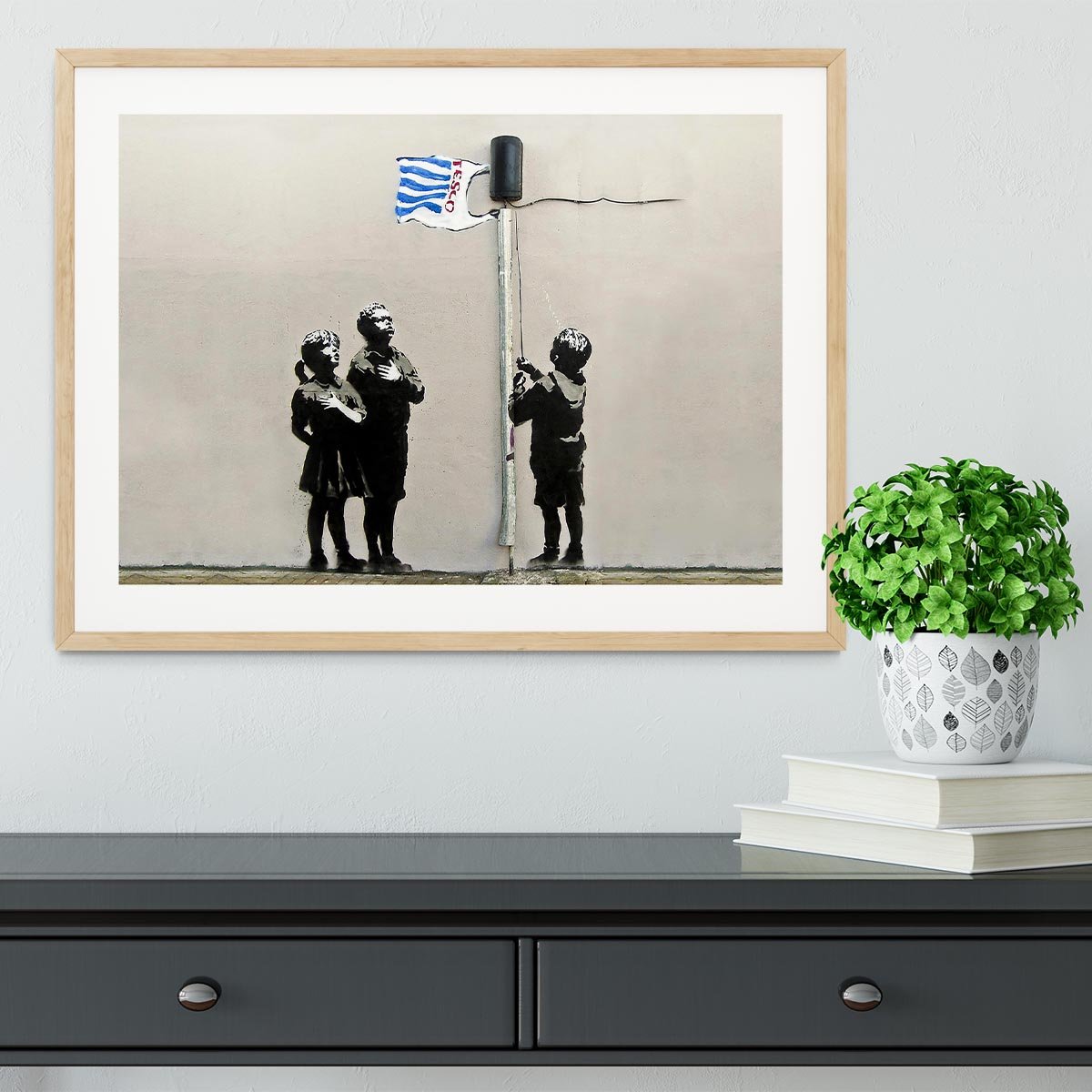 Banksy Raising the Tesco Flag (Very Little Helps) Framed Print