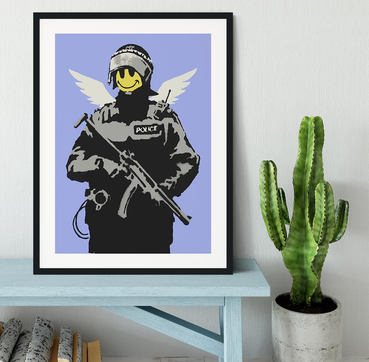 Banksy Smiley Angel Policeman Blue Framed Print - Canvas Art Rocks - 1