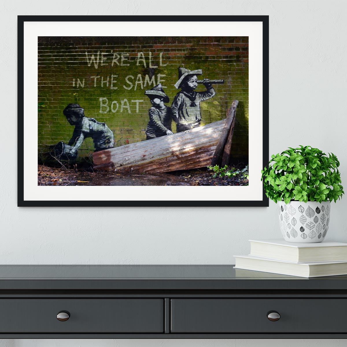 Banksy Were All In The Same Boat Framed Print - Canvas Art Rocks - 1