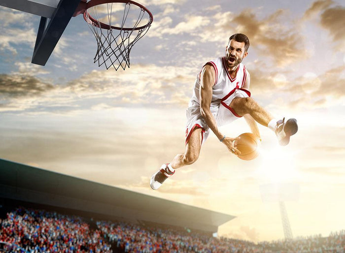 Basketball player in action Wall Mural Wallpaper