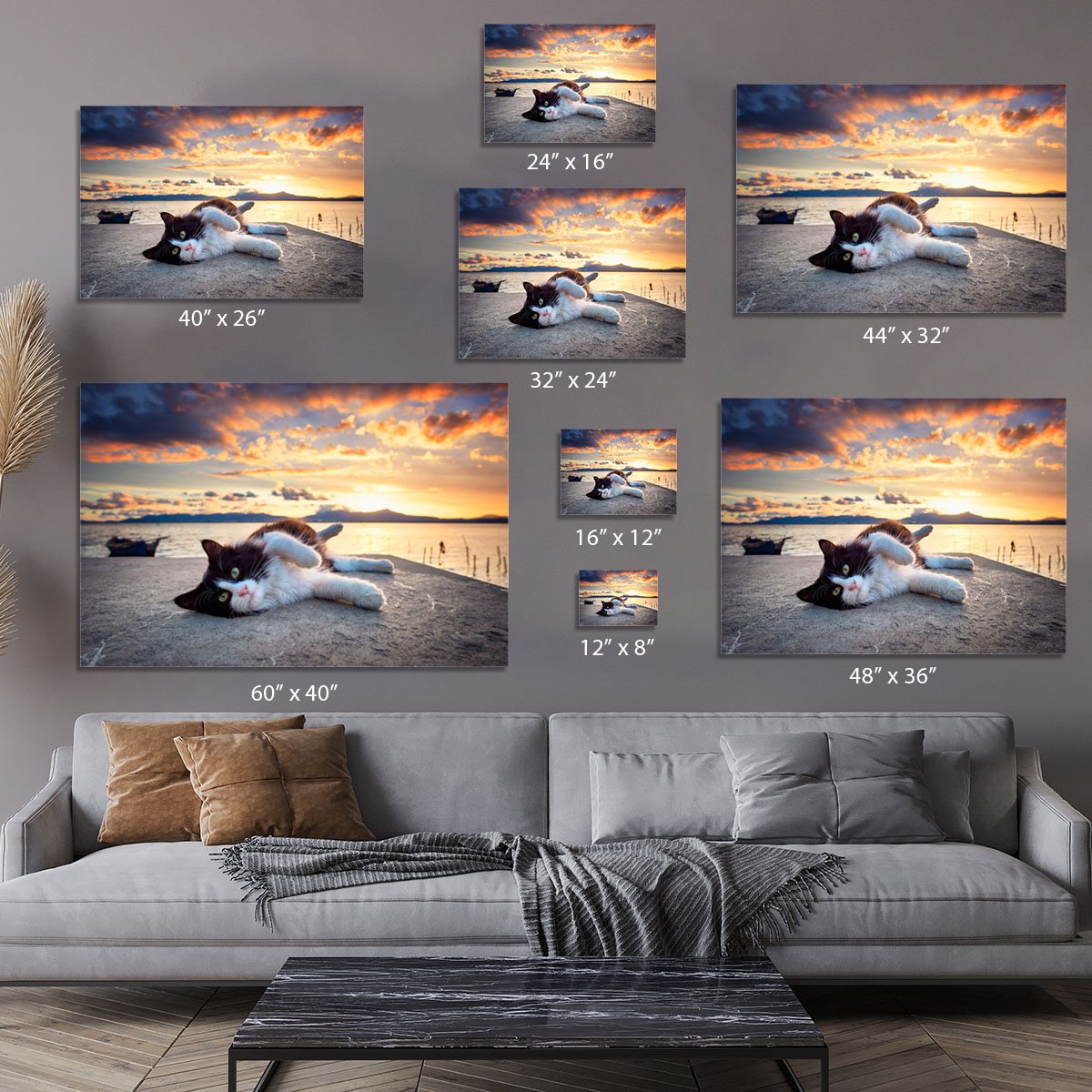 Black and white cat lying under a dramatic sunset on the lagoon Canvas Print or Poster