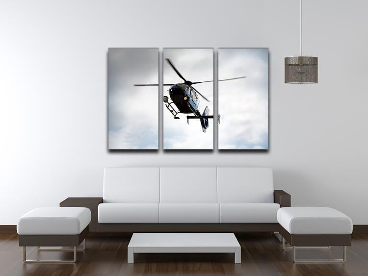 Blue and silver police helicopter flying above 3 Split Panel Canvas Print - Canvas Art Rocks - 3