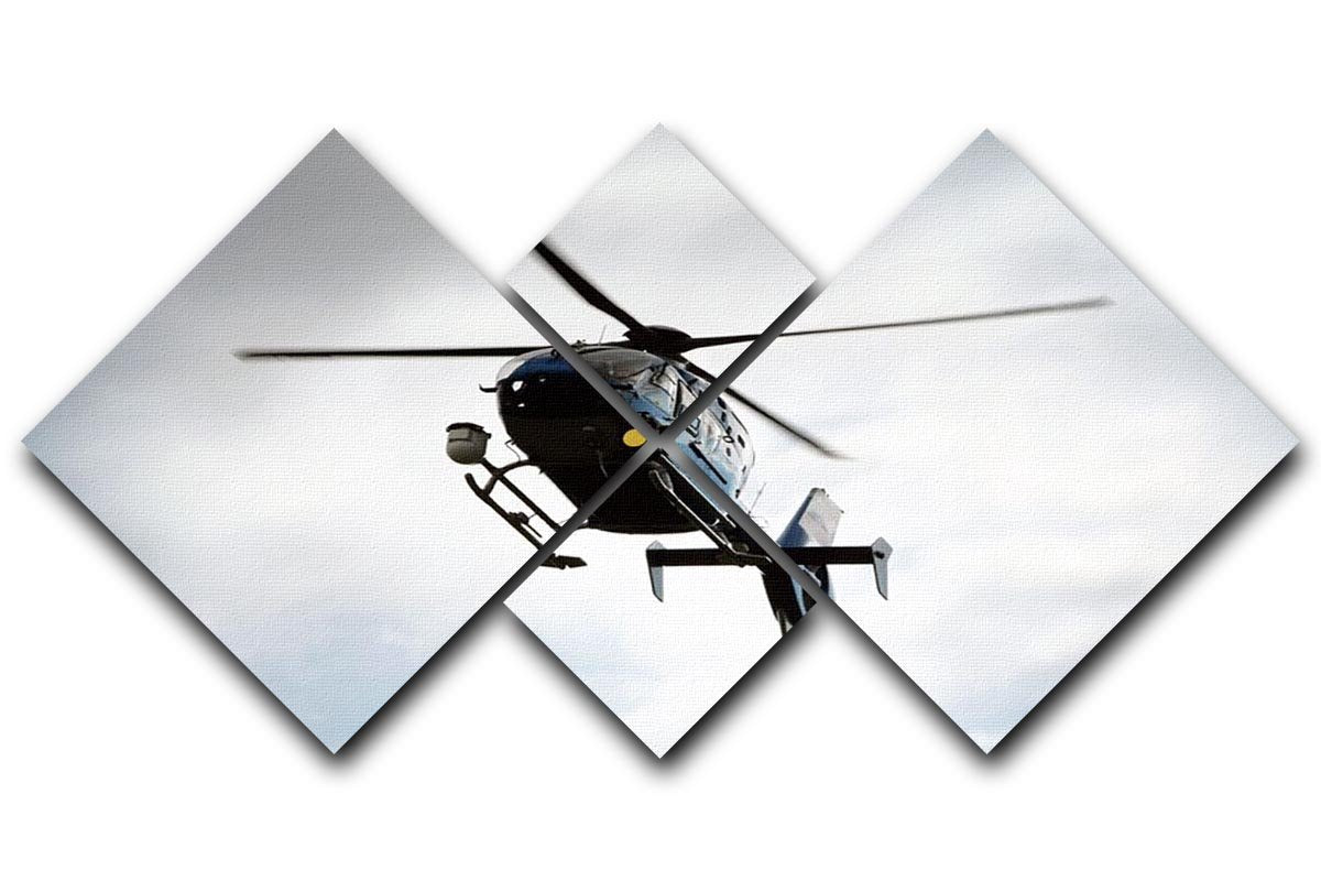 Blue and silver police helicopter flying above 4 Square Multi Panel Canvas  - Canvas Art Rocks - 1