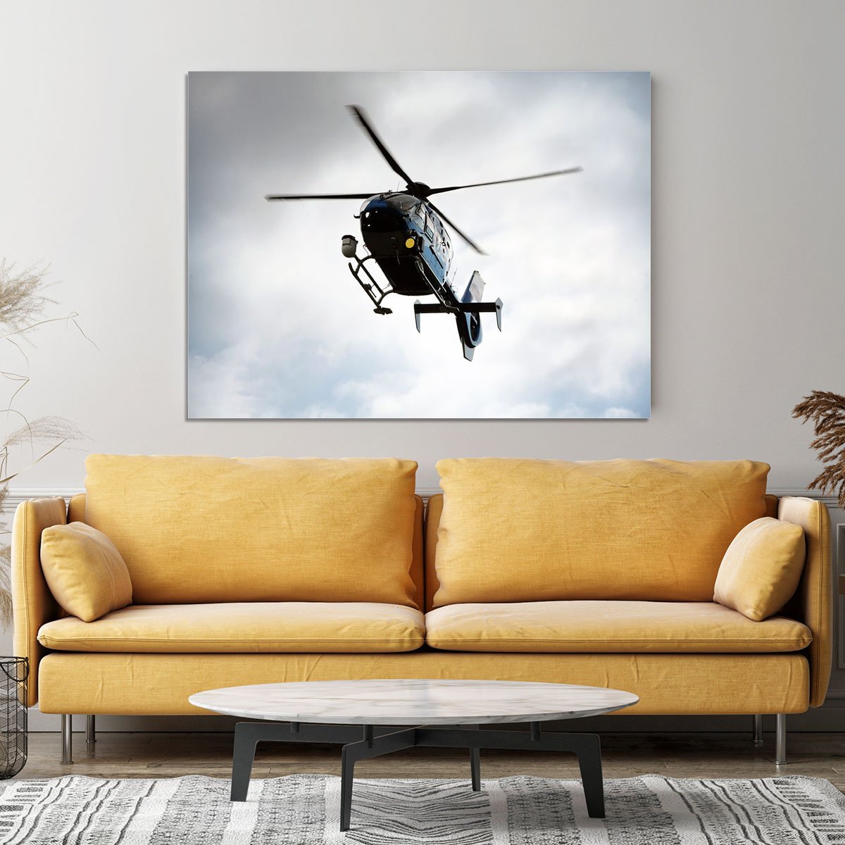 Blue and silver police helicopter flying above Canvas Print or Poster
