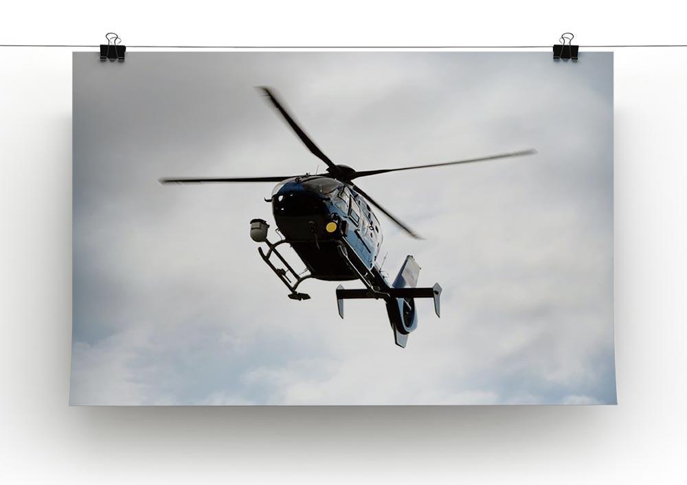 Blue and silver police helicopter flying above Canvas Print or Poster - Canvas Art Rocks - 2