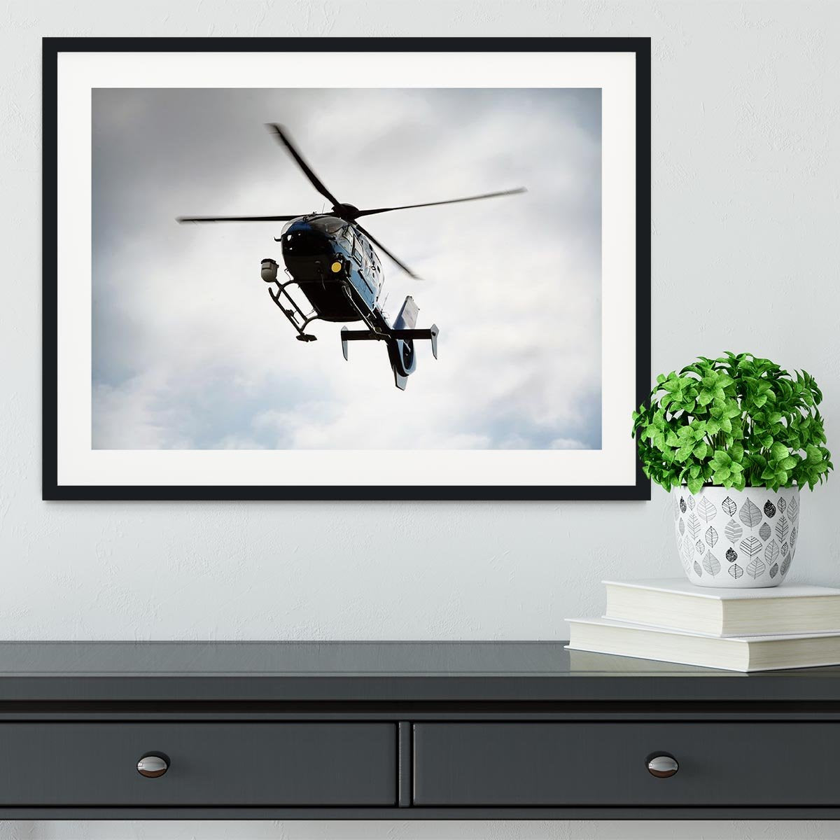 Blue and silver police helicopter flying above Framed Print - Canvas Art Rocks - 1