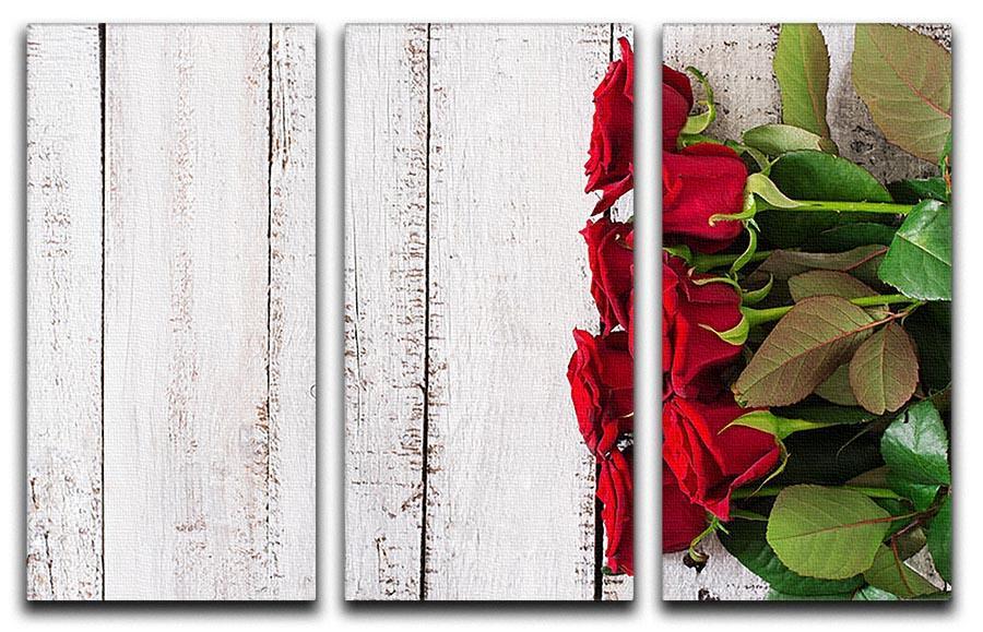 Bouquet of red roses on a light wooden background 3 Split Panel Canvas Print - Canvas Art Rocks - 1