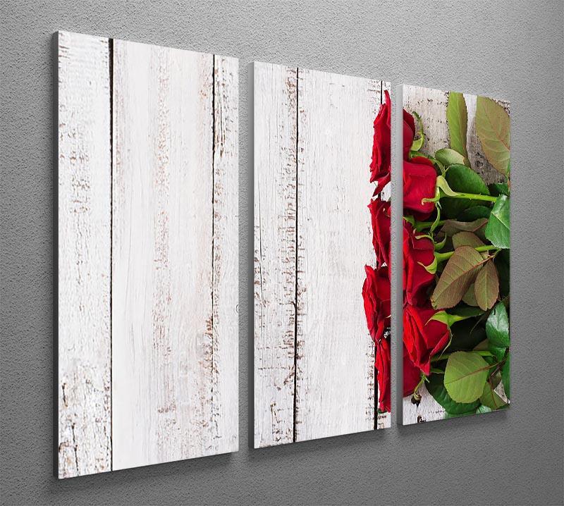 Bouquet of red roses on a light wooden background 3 Split Panel Canvas Print - Canvas Art Rocks - 2