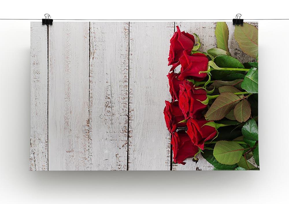 Bouquet of red roses on a light wooden background Canvas Print or Poster - Canvas Art Rocks - 2