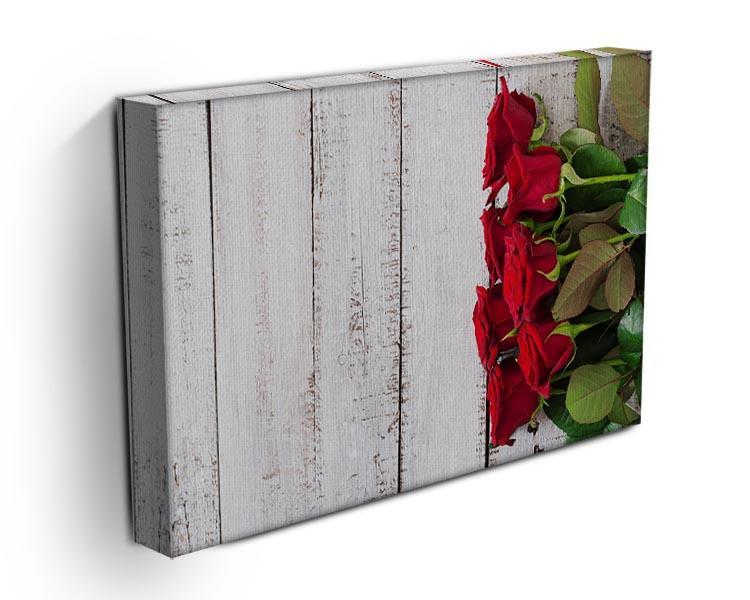Bouquet of red roses on a light wooden background Canvas Print or Poster - Canvas Art Rocks - 3