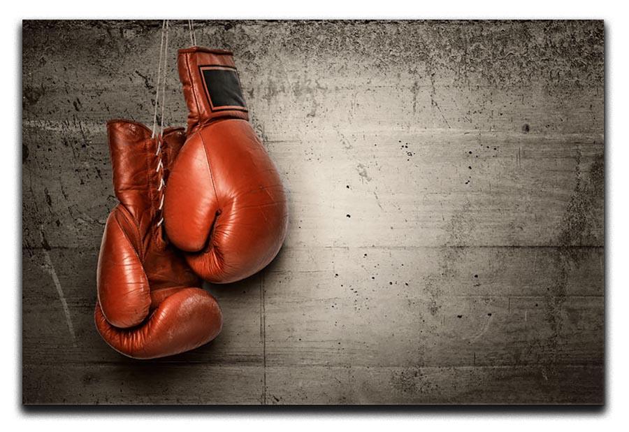 Boxing gloves hanging on concrete Canvas Print or Poster - Canvas Art Rocks - 1