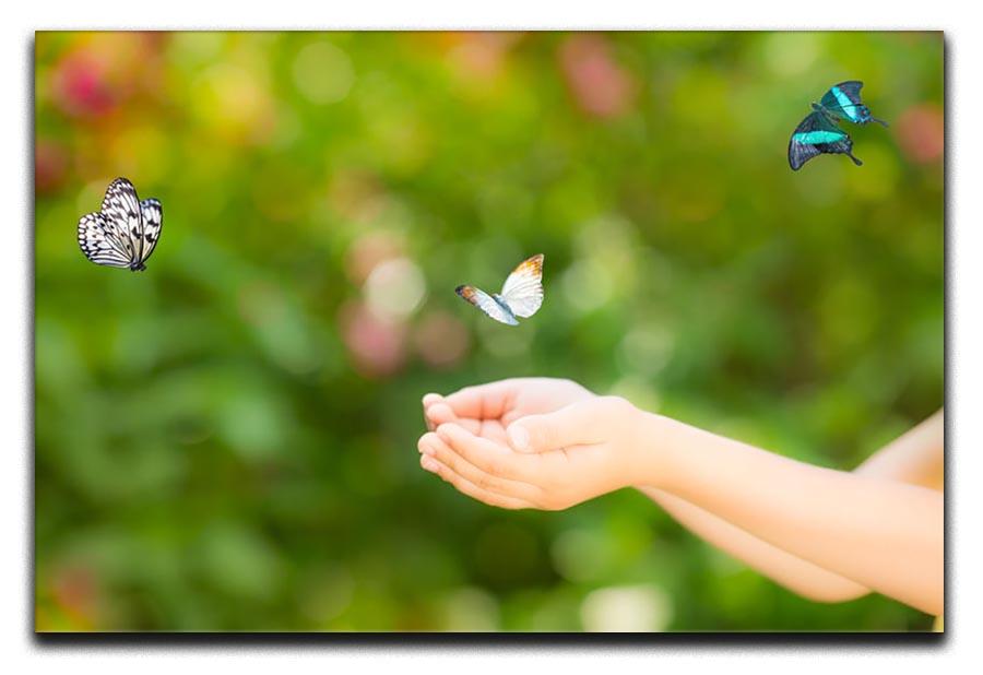 Children hands and flying butterfly Canvas Print or Poster - Canvas Art Rocks - 1