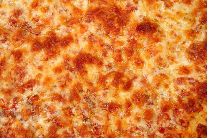 Close up of Cheese Bread Pizza Wall Mural Wallpaper
