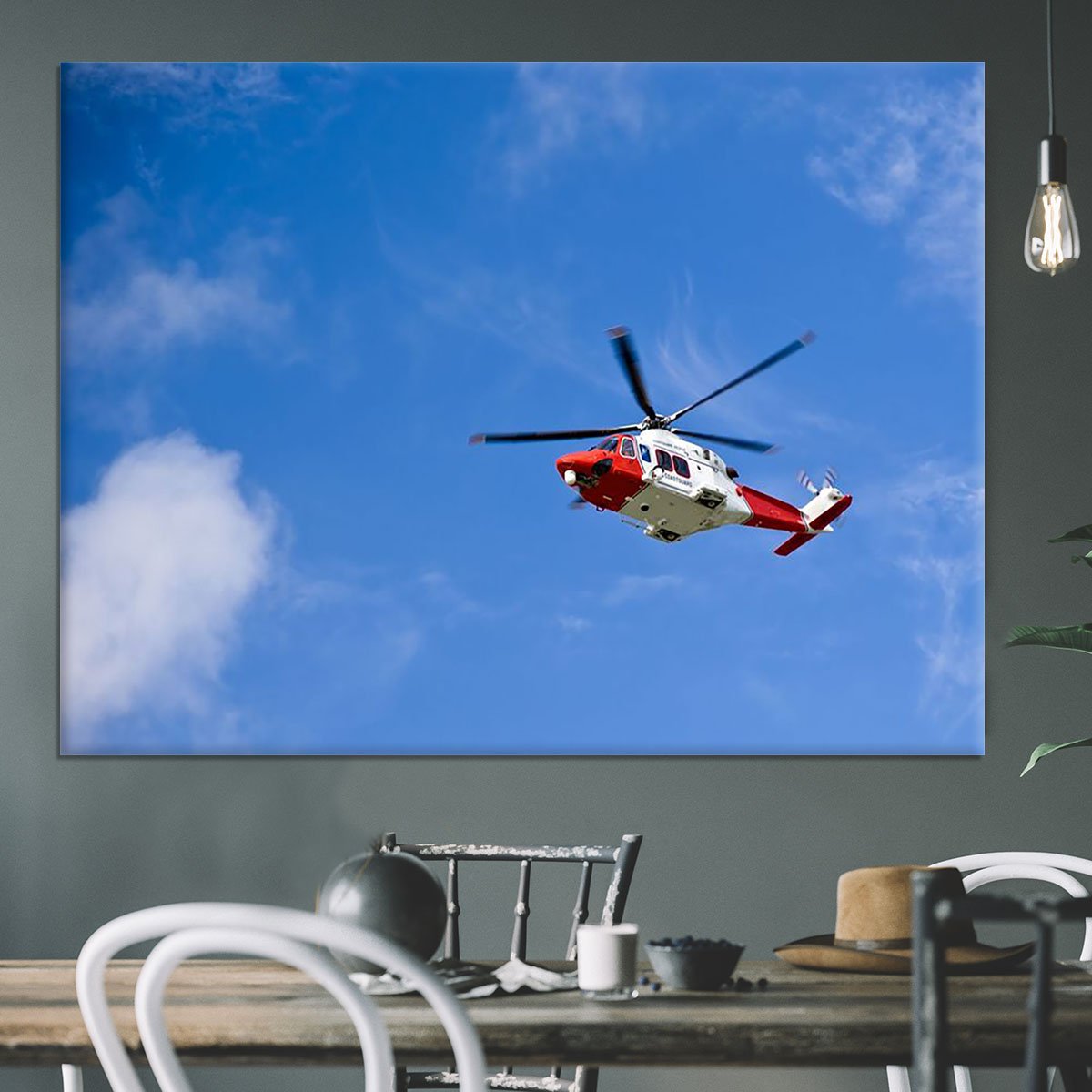 Coastguard helicopter in the blue sky Canvas Print or Poster